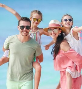 Young family on vacation on the beach